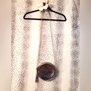 NEW WITH TAGS Faux Leather Round Purse with Zip Closure.  Gold trim and Tassel.